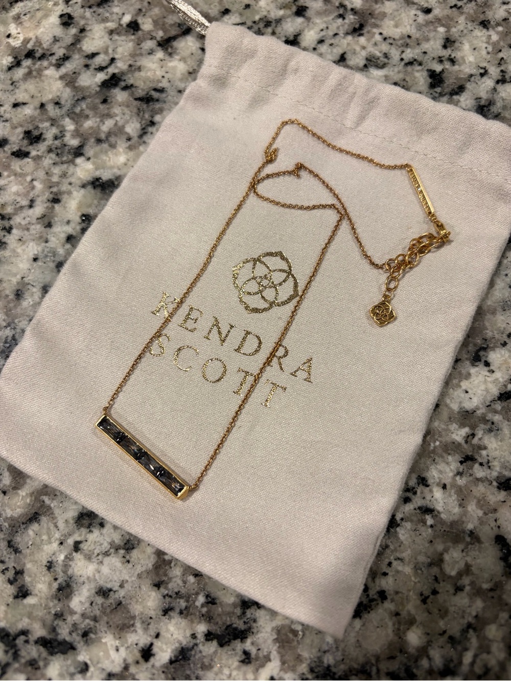 Kendra Scott Gold Necklace with Dark Gray Stone Bar